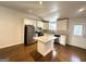 Modern kitchen featuring stainless steel appliances, white cabinets, and a center island at 2556 Godfrey Nw Dr, Atlanta, GA 30318