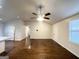 Spacious living room with hardwood floors, ceiling fan, and recessed lighting at 2556 Godfrey Nw Dr, Atlanta, GA 30318