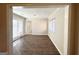 Bright sunroom with wood-look flooring, large windows, and sliding glass doors at 261 Howell Sw Ter, Atlanta, GA 30331