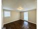 Inviting bedroom with polished wood floors and ample natural light at 6069 Wisteria Ln, Lithia Springs, GA 30122