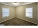 Comfortable bedroom with neutral walls, carpeted flooring, and ample natural light at 2843 Marco Nw Dr, Atlanta, GA 30318