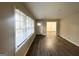 Spacious living room with abundant natural light and stylish flooring at 4372 Cook Pl, Decatur, GA 30035