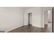 Empty bedroom with wood-look flooring and a closet at 671 Edgar St, Hampton, GA 30228