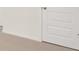 White door in a carpeted room at 671 Edgar St, Hampton, GA 30228