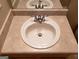 Simple bathroom sink with a vanity mirror above at 5330 Creekview Ln, Morrow, GA 30260