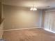 Empty dining area with sliding glass doors and neutral decor at 5330 Creekview Ln, Morrow, GA 30260