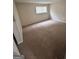 Large bedroom with ample natural light and carpeted flooring at 2033 Oak Park Ln, Decatur, GA 30032
