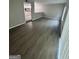 Spacious living room with wood-look flooring at 2033 Oak Park Ln, Decatur, GA 30032