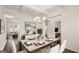 Elegant dining room with chandelier and hardwood floors at 1723 Goodwin, Hampton, GA 30228