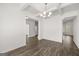Open dining room with hardwood floors and access to kitchen at 1723 Goodwin, Hampton, GA 30228