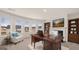 Bright home office with built-in shelving and large windows at 1723 Goodwin, Hampton, GA 30228