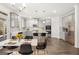 Modern kitchen with gray cabinets, island, and stainless steel appliances at 1723 Goodwin, Hampton, GA 30228