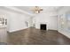 Open living room with hardwood floors, fireplace and lots of natural light at 1723 Goodwin, Hampton, GA 30228