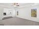 Spacious primary bedroom with fireplace and large windows at 1723 Goodwin, Hampton, GA 30228