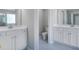 Modern bathroom featuring double sinks and toilet at 655 Edgar St, Hampton, GA 30228
