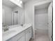 Double vanity bathroom with a large mirror and a separate shower at 655 Edgar St, Hampton, GA 30228