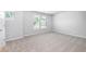 Cozy bedroom with carpet flooring and a window at 655 Edgar St, Hampton, GA 30228