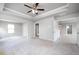 Bright bedroom with ceiling fan and access to other rooms at 655 Edgar St, Hampton, GA 30228