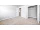 Well-lit bedroom with carpet and closet at 655 Edgar St, Hampton, GA 30228