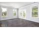 Bright dining room with hardwood floors and access to patio at 655 Edgar St, Hampton, GA 30228
