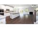 Open concept kitchen with hardwood floors at 655 Edgar St, Hampton, GA 30228