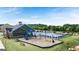 Community pool with playground and clubhouse at 655 Edgar St, Hampton, GA 30228