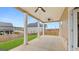 Relaxing covered patio overlooking a fenced backyard at 667 Edgar # 26, Hampton, GA 30228