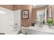 Clean bathroom with a tub, sink, and modern fixtures at 667 Edgar # 26, Hampton, GA 30228