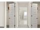 View of a bright bathroom with double sinks and a tub at 667 Edgar # 26, Hampton, GA 30228