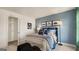 Blue-walled bedroom with car-themed artwork at 667 Edgar # 26, Hampton, GA 30228