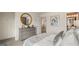 Well-lit bedroom featuring a dresser and a queen-size bed at 667 Edgar # 26, Hampton, GA 30228