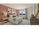 Bedroom with blush walls and a window with a view at 667 Edgar # 26, Hampton, GA 30228