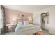 Bright bedroom with walk-in closet and window at 667 Edgar # 26, Hampton, GA 30228