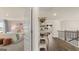 Open bedroom with a view into another room and a built-in shelf at 667 Edgar # 26, Hampton, GA 30228