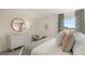 Well-lit bedroom featuring a large mirror and dresser at 667 Edgar # 26, Hampton, GA 30228