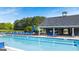 Relaxing community pool with a clubhouse and playground at 667 Edgar # 26, Hampton, GA 30228