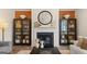 Elegant fireplace with built-in shelving and a large mirror at 667 Edgar # 26, Hampton, GA 30228