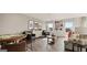 Game room with a seating area, game table and plenty of natural light at 667 Edgar # 26, Hampton, GA 30228