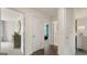 Bright hallway with doors to bedrooms and ample floor space at 667 Edgar # 26, Hampton, GA 30228