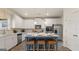 Modern kitchen with white cabinets and center island at 667 Edgar # 26, Hampton, GA 30228