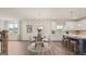 Modern kitchen with island and breakfast nook at 667 Edgar # 26, Hampton, GA 30228