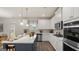 Spacious kitchen with an island and stainless steel appliances at 667 Edgar # 26, Hampton, GA 30228