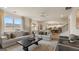 Open concept living room with views into the kitchen at 667 Edgar # 26, Hampton, GA 30228
