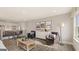 Spacious loft area with sitting area, game table, and built-in shelving at 667 Edgar # 26, Hampton, GA 30228