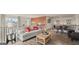 Open loft area with seating and a game table at 667 Edgar # 26, Hampton, GA 30228