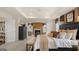Main bedroom featuring a large bed, fireplace and sitting area at 667 Edgar # 26, Hampton, GA 30228