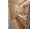 Double vanity bathroom with a tiled floor and plenty of counter space at 98 Gleneagles Dr, Fayetteville, GA 30215