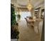 Elegant dining room with a large chandelier and marble table at 98 Gleneagles Dr, Fayetteville, GA 30215