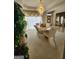Elegant dining room with a large chandelier and marble table at 98 Gleneagles Dr, Fayetteville, GA 30215