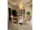 Elegant dining room with a chandelier and large hutch at 98 Gleneagles Dr, Fayetteville, GA 30215